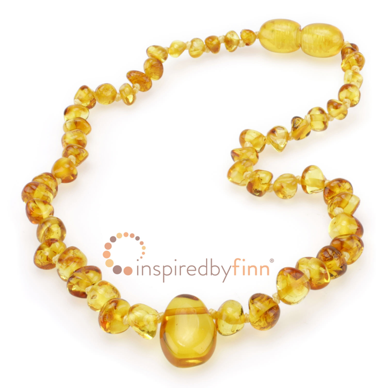 <u>Polished Golden Swirl Pendant</u>