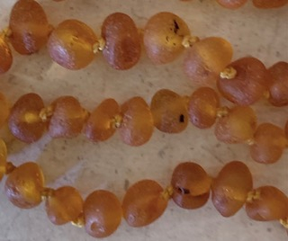 <u>Baltic Amber Necklace - Sizes Apx 11.5 - 12.5"<br>Unpolished Brown 1 or 2 Spots</u>